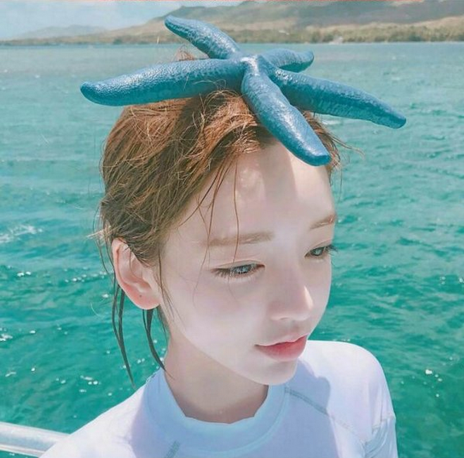 最新夏日海邊女生圖片甜美可愛 去同一片海灘